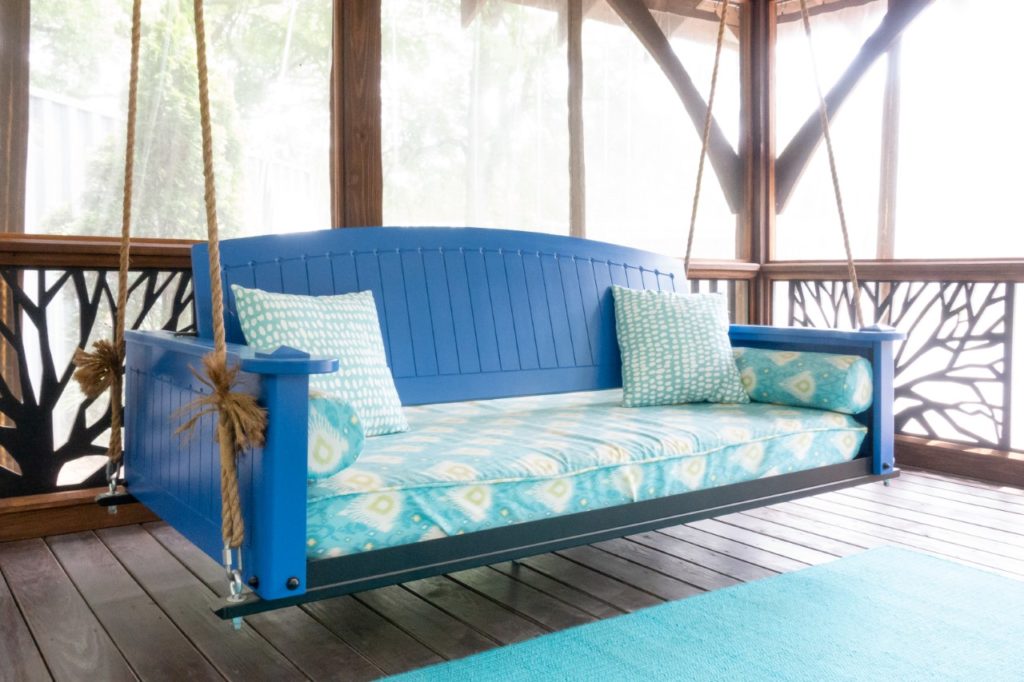 The Retreat Porch swing bed by PorchCo customized in a vibrant color.